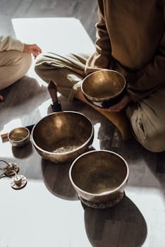 pexels-photo-6997994-6997994 Mindful meditation session using Tibetan singing bowls for relaxation and healing